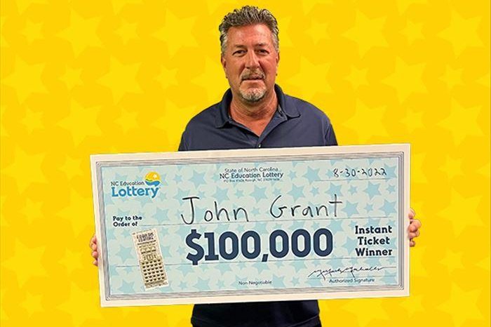 John Grant of Bolivia, N.C., said he used a lucky penny he found on the ground next to his truck to reveal the $100,000 prize on his scratch-off lottery ticket. Photo courtesy of the North Carolina Education Lottery