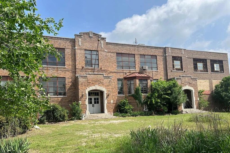 A former high school in Burbank, Okla., is listed online as a single-family home with an asking price of $60,000. Photo by Bill White Real Estate/Zillow