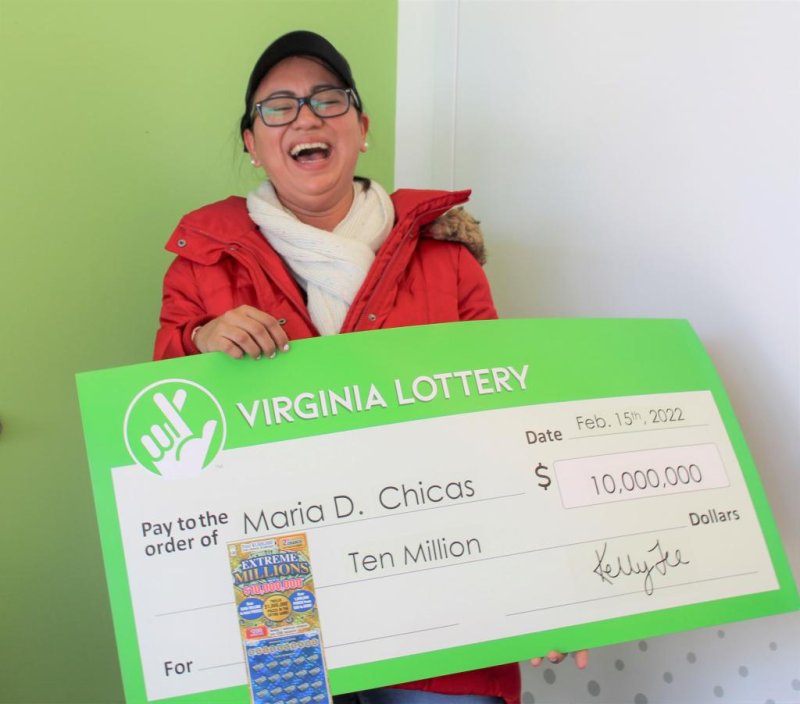 Maria Chicas of Haymarket, Va., said her husband gave her a scratch-off lottery ticket worth $10 million as a gift for Valentine's Day. Photo courtesy of the Virginia Lottery