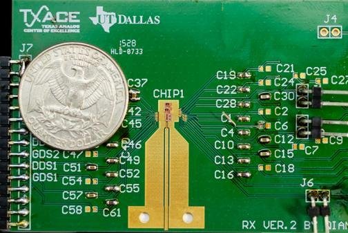 Researchers determined that using integrated circuits, including one shown to the right of the United States quarter and below the label "CHIP1" in an electronic nose will make the device more affordable. Photo by University of Texas Dallas