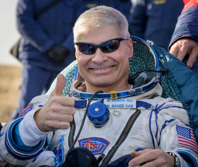 Mark Vande Hei gives a thumbs up after returning to Earth following a record-setting 355 days in space. Photo courtesy of NASA/Flickr