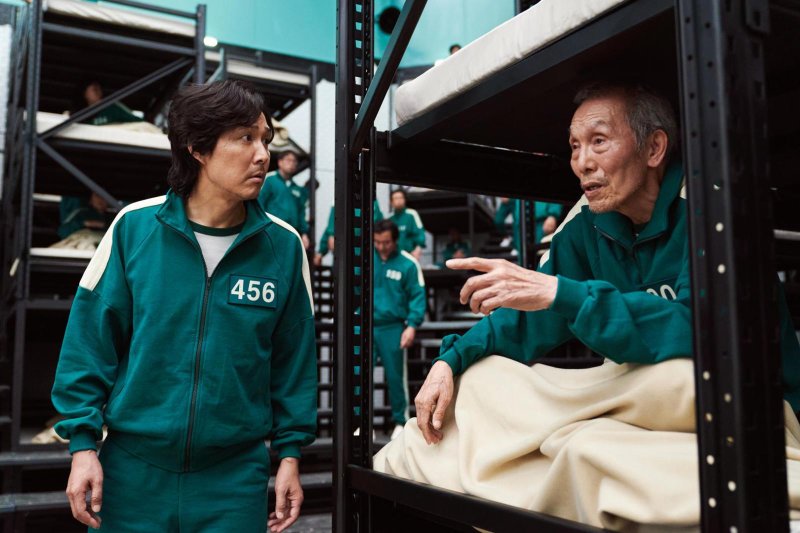 Lee Jung-jae (L) and Oh Young-soo in a scene from "Squid Game." Photo courtesy of Netflix