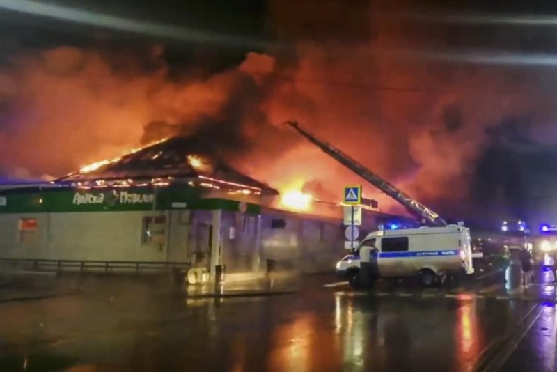 At least 13 people are dead after a fire ripped through a nightclub, causing the roof to collapse in the Russian city of Kostroma on Saturday night. Photo courtesy of Russian Emergencies Mininistry/EPA-EFE