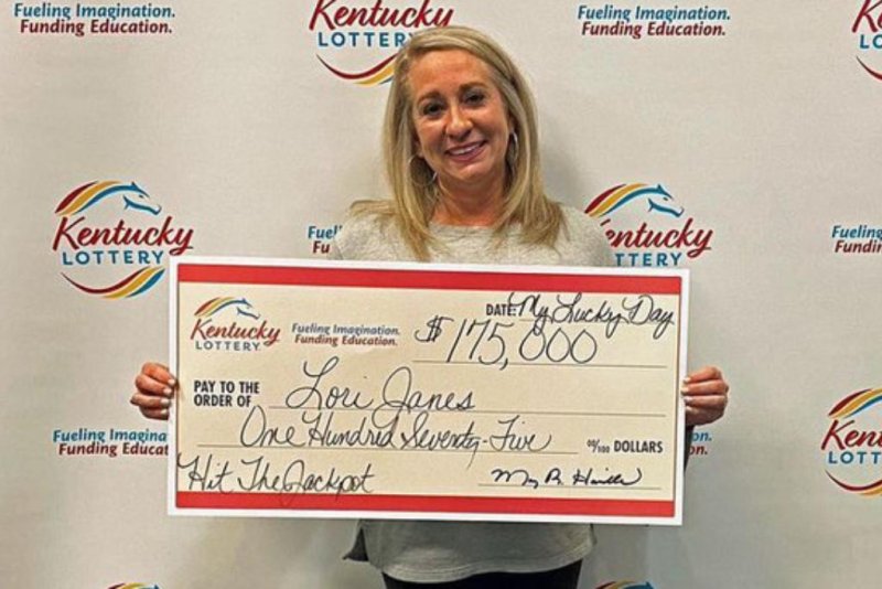 Lori Janes won $175,050 from scratch-off lottery tickets she received during an office holiday party gift exchange. Photo courtesy of the Kentucky Lottery