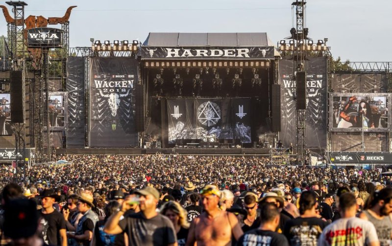 Visitors attend the Wacken Open Air festival, in Wacken, Germany, on August 2. Approximately 75,000 people attended the annual festival this year. Photo by Srdjan Suki/EPA-EFE