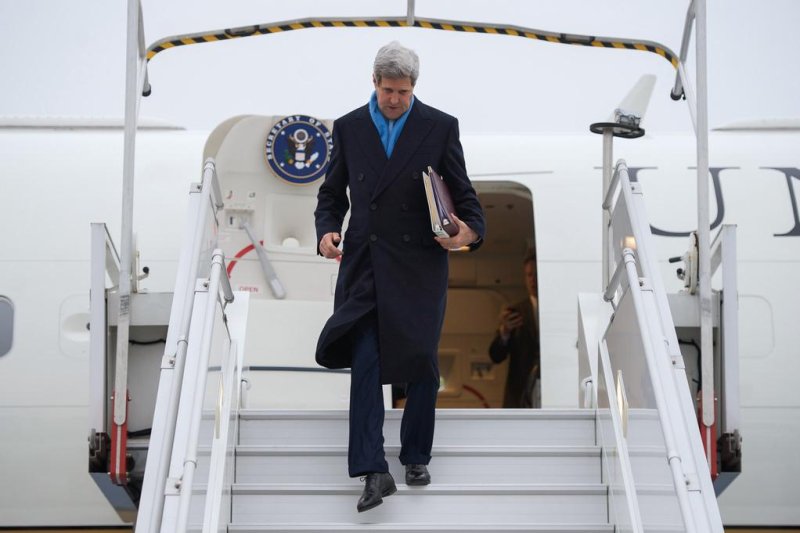U.S. Secretary of State John Kerry disembarks from his Air Force jet after arriving in Paris, France, on Nov.ember 20, 2014, for consultations with French Foreign Minister Laurent Fabius and Foreign Minister Saud al-Faisal of Saudi Arabia in advance of his arrival in Vienna, Austria, for negotiations with Iran about the future of its nuclear program. (UPI/U.S. Department of State)