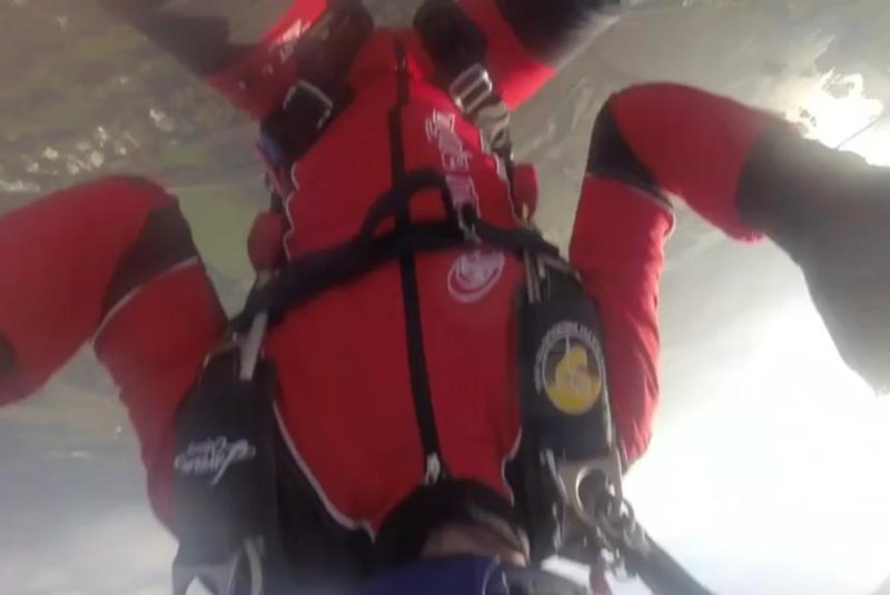 Sky diver drops camera at 3,000 feet, makes lucky catch with legs
