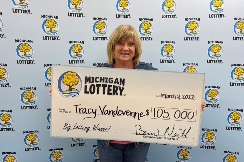 Tracy Vandevenne won $100 from a Michigan Lottery scratch-off ticket and used some of her winnings to buy a ticket for the Fantasy 5 drawing, which earned her a $105,000 jackpot. Photo courtesy of the Michigan Lottery