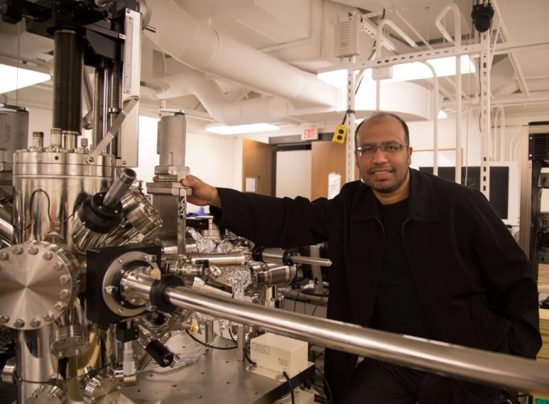M. Zahid Hasan and his group of scientists researched and simulated dozens of crystal structures before finding the one suitable for holding Weyl fermions. Once fashioned, the crystals were loaded into this two-story device known as a scanning tunneling spectromicroscope to ensure they matched theoretical specifications. Photo by Danielle Alio/Princeton University
