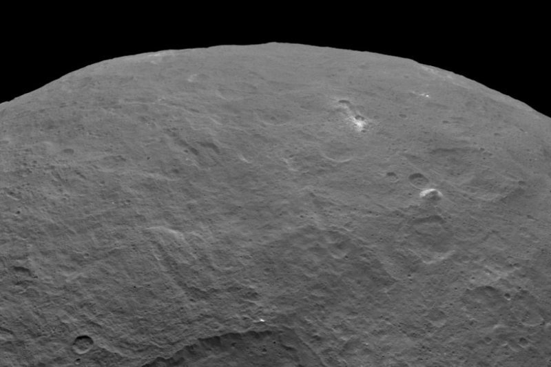 New Ceres images captured by Dawn show a pyramid-like mountain peak, pictured upper right. Photo by NASA/JPL
