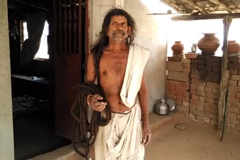 Indian man seeks Guinness record with 62-foot-long hair