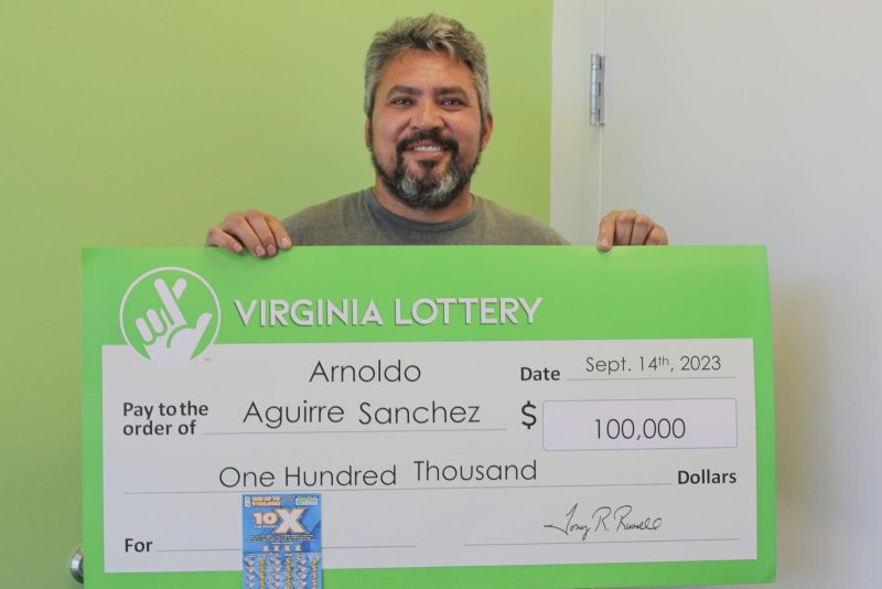 Arnoldo Sanchez stopped for a drink on his way to work in Virginia and won $100,000 from a scratch-off lottery ticket. Photo courtesy of the Virginia Lottery