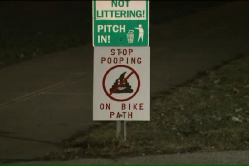 Ill. town's signs tell hikers: 'Stop pooping on bike path'