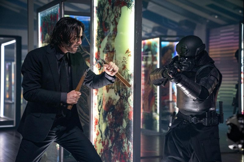 John Wick (Keanu Reeves) uses nunchucks against an armored assassin. Photo courtesy of Lionsgate