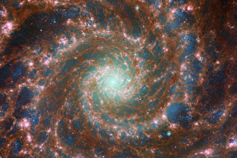 New images jointly published by NASA and the European Space Agency show the inner workings of Phantom Galaxy, M74. Photo by NASA