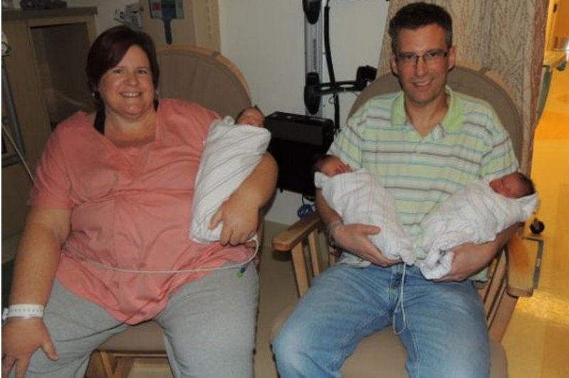 April Dooley welcomes rare identical triplets - UPI.com