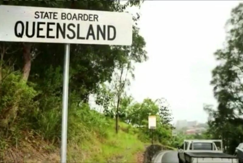 This sign at Queensland's state "boarder" in Australia was replaced Wednesday with a correctly-spelled version. 7News video screenshot