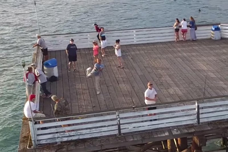 Fisherman hooks a flying drone in San Diego
