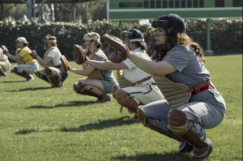 Carson Shaw (Abbi Jacobson, R) attends catcher practice. Photo courtesy of Prime Video