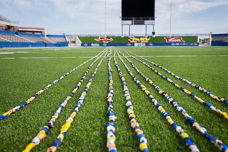 Students at Valley Creek Elementary School in McKinney, Texas, broke a Guinness World Record by assembling a friendship bracelet measuring 2,795 feet and 9 inches long. Photo courtesy of McKinney ISD