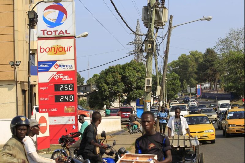 French energy company Total sells off some of its maturing assets in Gabon, a member of OPEC, for $350 million. Pictured, a Total fuel station in the West African country of Liberia. Photo by Ahmed Jallanzo/EPA