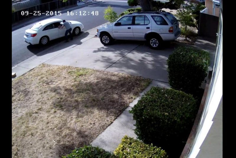 Ken Jensen chases after a man who tried to take a package from his porch. mayorofclaycord/YouTube video screenshot