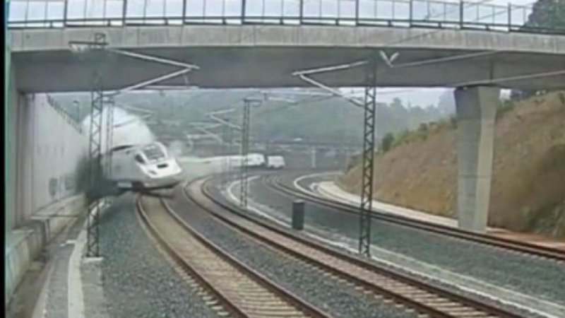 High speed train derails in Spain while rounding corner. (screenshot/TIME)