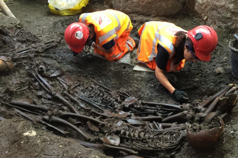 Archaeologists found 30 skeletons in a mass grave, all of which appear to have died of the bubonic plague in 1665 in London. Thousands of people in the city died of the plague in the 17th century. Photo courtesy Crossrails