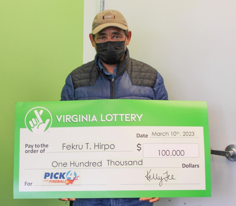 Fekru Hirpo of Alexandria, Va., bought 20 identical tickets for a Virginia Lottery Pick 4 drawing and won 20 times, for a total prize of $100,000. Photo courtesy of the Virginia Lottery