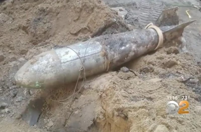 Police in New York issued a bomb threat after construction crews uncovered a time capsule placed inside a hollow World War II bomb shell. Screen capture/CBS New York/Inform Inc.