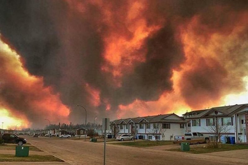 Suncor Energy advised most of its non-critical staff to stay home after a massive wildfire threatened the oil-rich area in Canada. Photo courtesy Delta Firefighters/Twitter