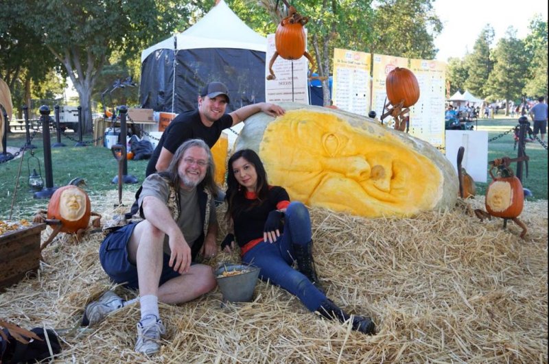 Michael Brown of Missouri, Brandy Davis of Idaho and Deane Arnold of Ohio carved the Guinness World Record largest jack-o-lantern from a pumpkin grown by Josiah Brandt. Photo courtesy of the Cosumnes Community Services District