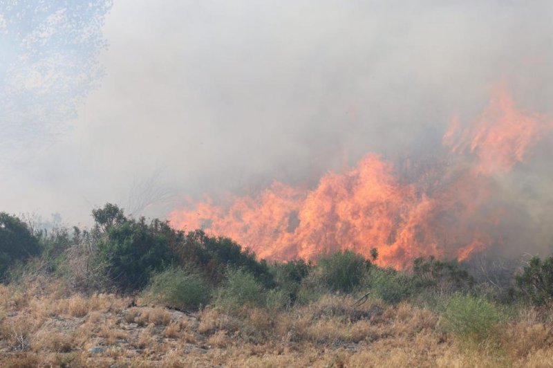 Image of the Hesperia, California wildfire burning in San Bernardino County on Monday. It was 50% contained as of late Monday. Photo by San Bernardino County Fire Department/UPI