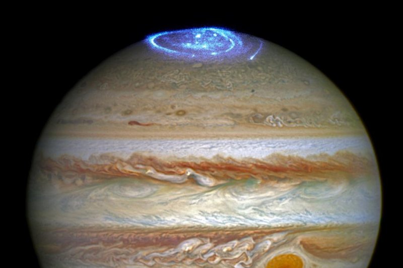 Jupiter's polar auroras are the brightest in the solar system. Photo by NASA/ESA/J. Nichols/University of Leicester