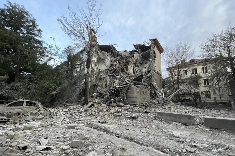 A residential area in the city of Zaporizhzhia, southeastern Ukraine, came under shelling from Russian forces on Thursday. Photo courtesy of State Emergency Service of Ukraine/EPA-EFE
