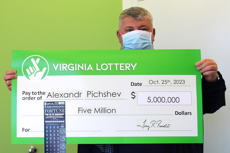 Alexandr Pichshev said he hadn't planned to buy a lottery ticket, but a last-minute decision led to his winning $5 million. Photo courtesy of the Virginia Lottery