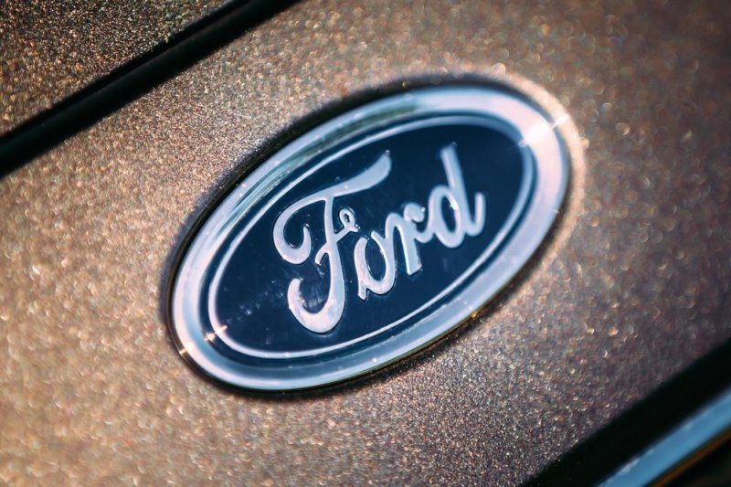 Ford Motor Co. announced a recall on Thursday that affects nearly 830,000 of the automaker's vehicles in North America over a defective latch spring that the company said could lead to a side door opening while the vehicle is in motion. The recall affects vehicles manufactured at plants in Michigan, Kentucky and Spain. File Photo by Grisha Bruev/Shutterstock