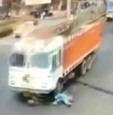 Woman chases truck that ran her over [VIRAL VIDEO]