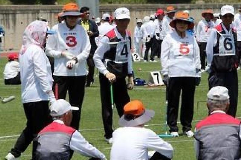 South Korean senior citizens enjoy a game of gateball, a form of croquet popular in retirement communities. File Photo by Yonhap