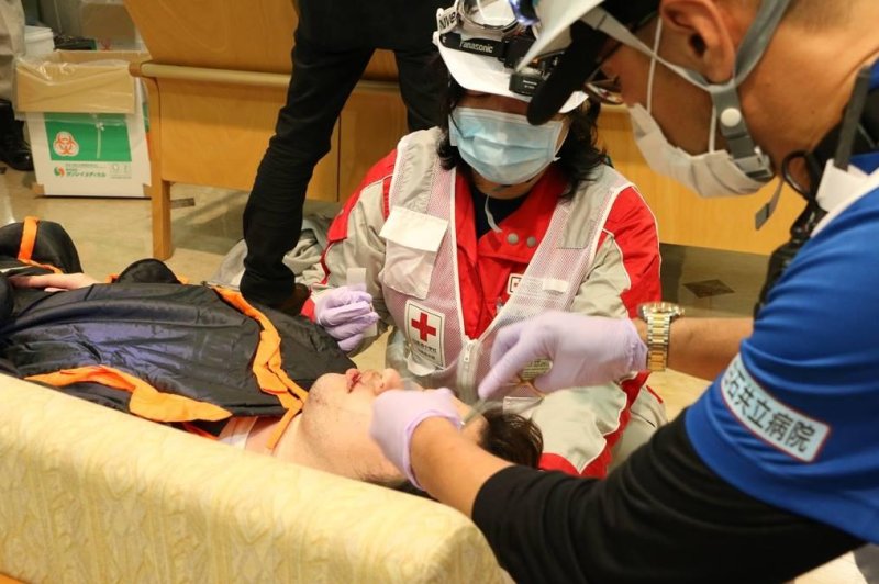 A victim of the recent earthquakes in southern Japan is treated at the Kumamoto Red Cross hospital. Photo courtesy of the Japanese Red Cross/Facebook