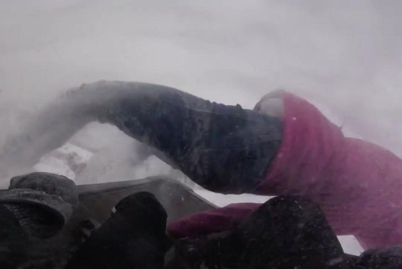 College students sledding in a canoe send girl flying