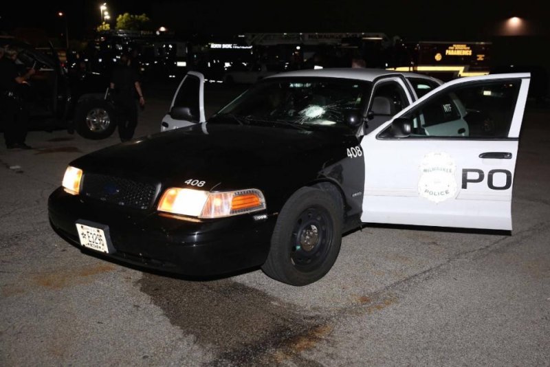 A Milwaukee police officer was one of two people injured Sunday after a rock hit the windshield of a police cruiser. Photo courtesy the Milwaukee Police Department