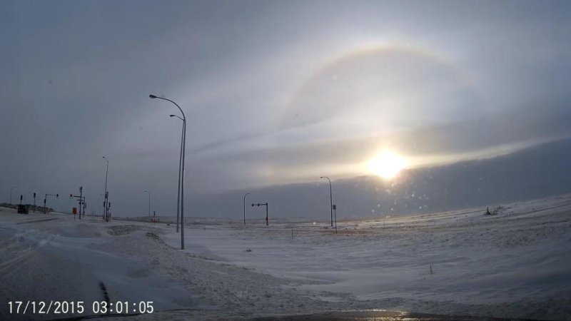 A sundog illusion appears in the sky after a Manitoba snowstorm. Newsflare video screenshot