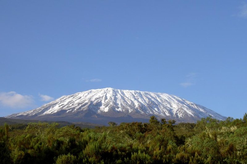 Tourists climbing Mount Kilimanjaro will be able to access the Internet while scaling the volcanic mass after the government of Tanzania installed a broadband network at Uhuru Peak. Photo by Chris 73/<a href="https://commons.wikimedia.org/wiki/File:Mt._Kilimanjaro_12.2006.JPG">Wikimedia Commons</a>