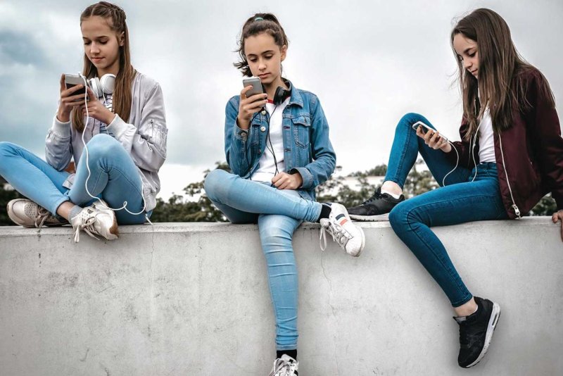 A Gallup poll Friday showed 51% of U.S. teens spend an average of 4.8 hours a day on social media. Girls spend nearly an hour more per day than boys do on social media. Photo courtesy of Gallup