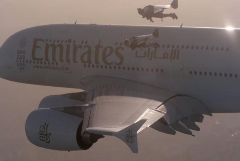 Jetpack duo fly in formation with Airbus 380 over Dubai