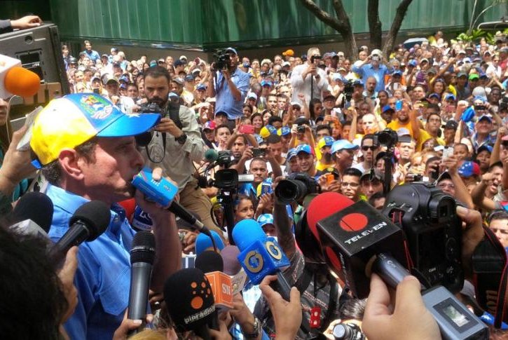 Henrique Capriles Radonski, governor of Venezuela's Miranda state and a key opposition leader, spoke to a large crowd in Caracas on Wednesday as part of a protest aimed to show discord with a Supreme Court decision that banned protests near the country's electoral council. Photo courtesy of RevocaloYA