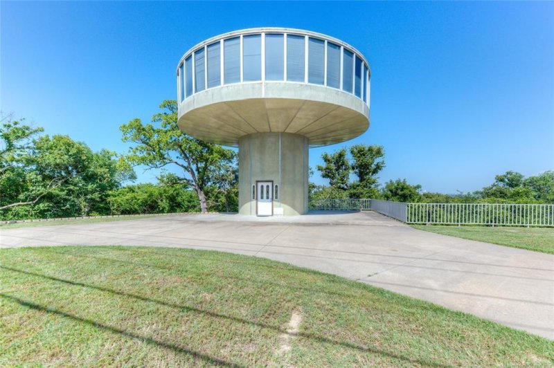 A house for sale in Tulsa, Okla., is drawing attention online due to its resemblance to the saucer-shaped house from "The Jetsons." Photo courtesy of Chinowth &amp; Cohen Realtors