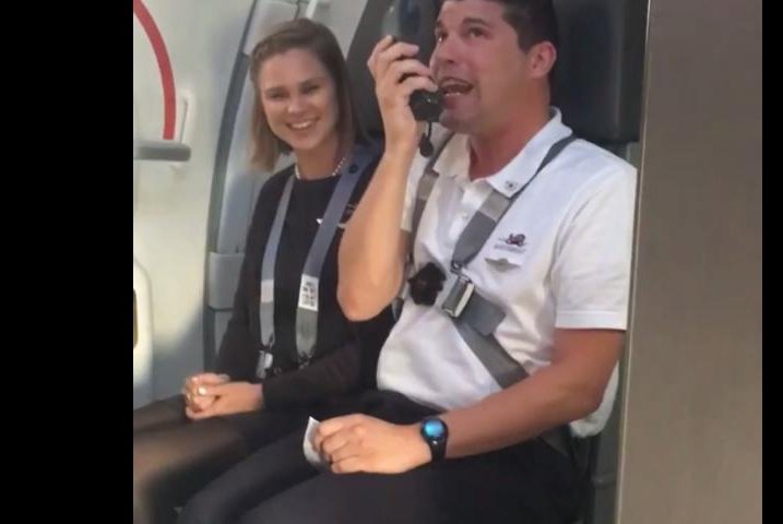 Southwest Airlines flight attendant Zach Haumesser gives announcements as "Looney Tunes" characters. Screenshot: Jordy Elizabeth/YouTube