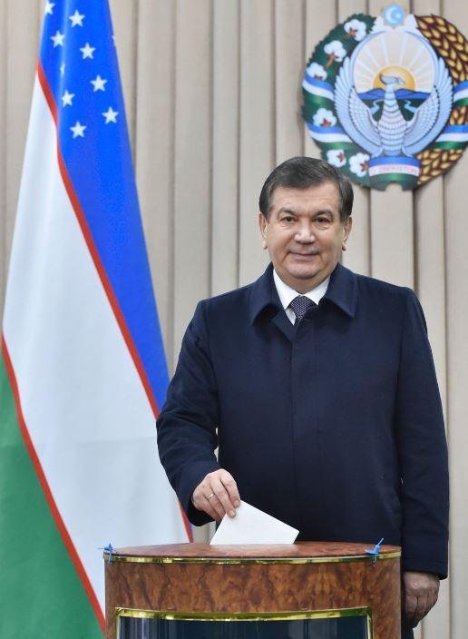 Interim President Shavrat Mirziyoyev casts his vote in Uzbekistan's presidential election Sunday. He won with 88.6 percent of the vote. Photo by Anvar Ilyasov/European Pressphoto Agency/Pool